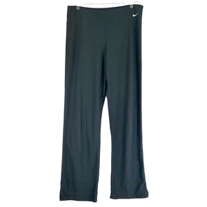 Women’s Nike Yoga Dri-FIT Mid-Rise Flared Leggings in Black Size Medium